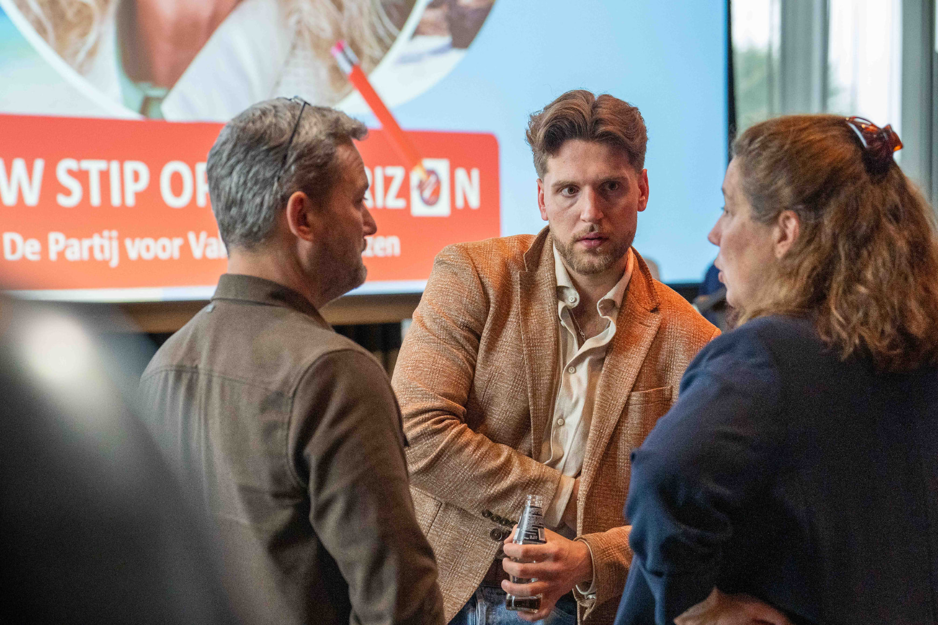 Kelvin in conversation with travel professionals at an ANVR event